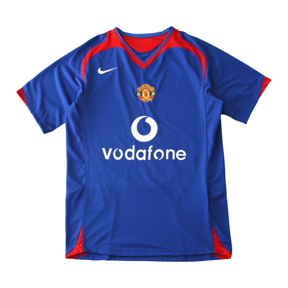 Manchester United Retro Away Jersey | 2005/06 Fan Version. Blue with red accents, Vodafone sponsor, and Nike logo.
