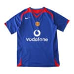 Manchester United Retro Away Jersey | 2005/06 Fan Version. Blue with red accents, Vodafone sponsor, and Nike logo.