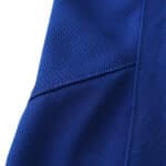 Close-up of the Manchester United Retro Away 2005/06 Fan Version jersey fabric, showcasing its detailed stitching and textured material.