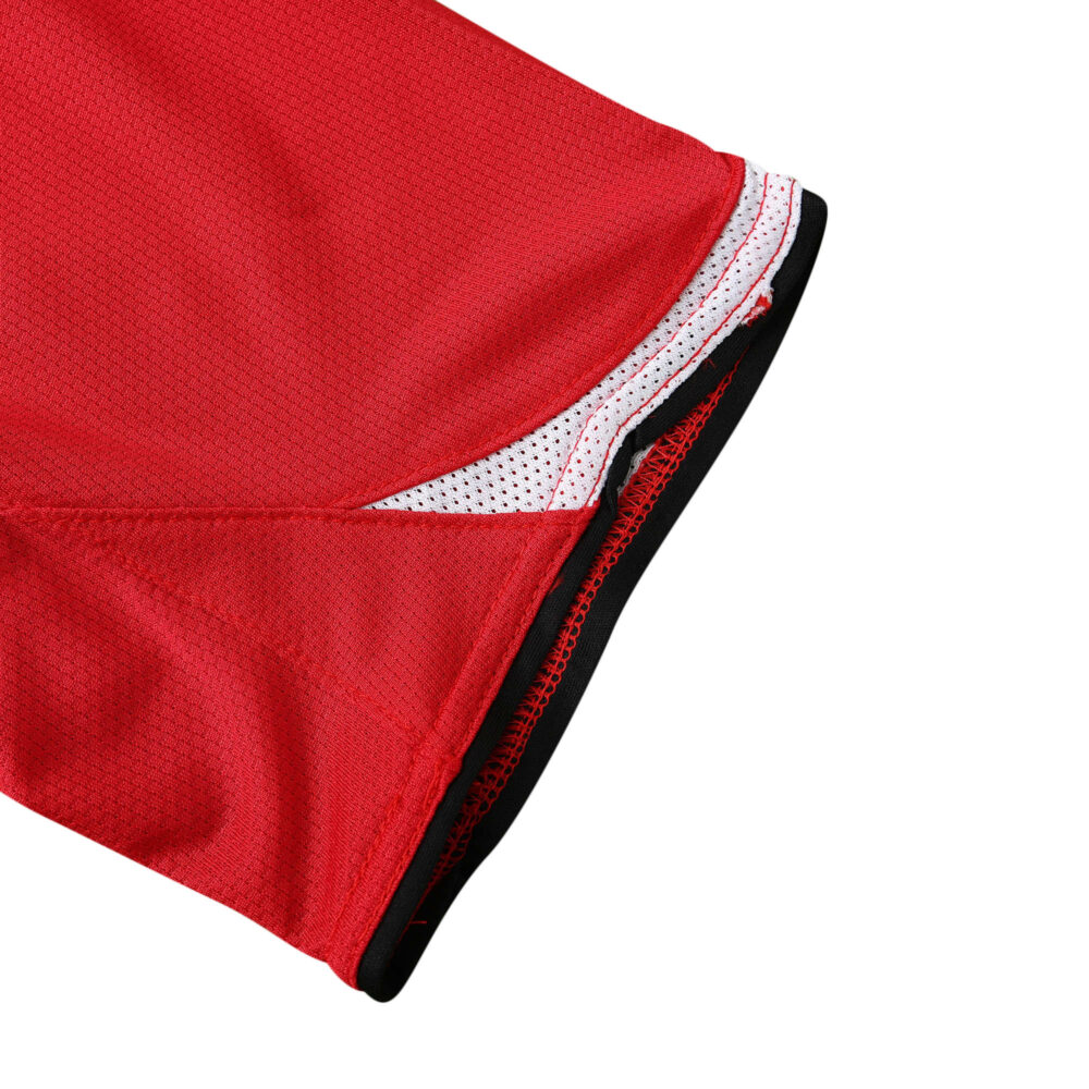 Close-up of the sleeve and hem detail of Manchester United Retro Home 2004/05 Fan Version jersey in red with white accents.