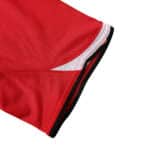 Close-up of the sleeve and hem detail of Manchester United Retro Home 2004/05 Fan Version jersey in red with white accents.