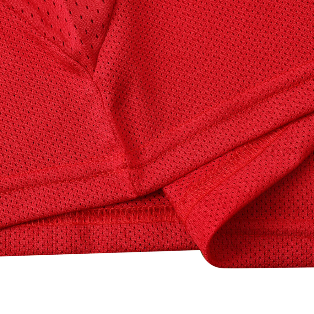 Close-up of the fabric and stitching on the Manchester United Retro Home 2004/05 fan version jersey, showcasing its texture and quality.