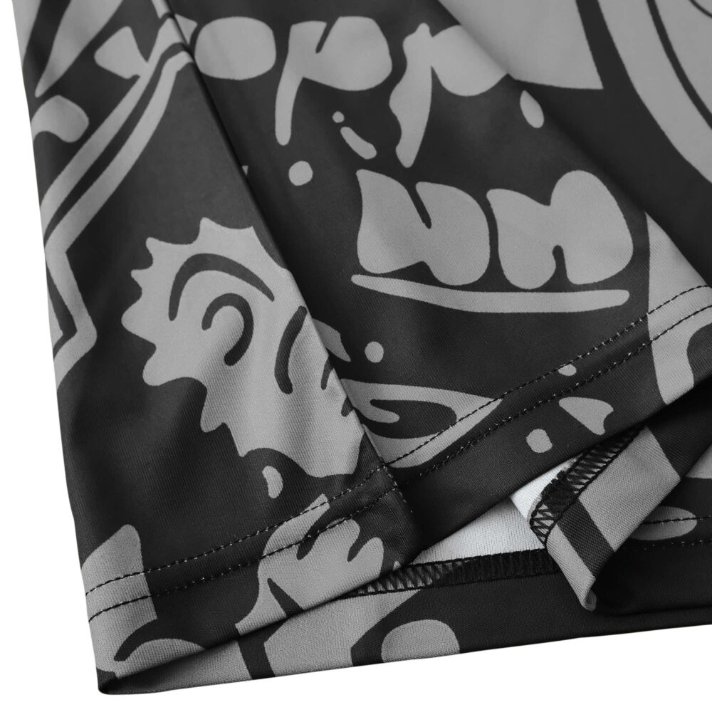 Close-up of fabric detailing on the Mexico Retro Away 1998 Fan Version jersey, showcasing gray and black abstract patterns.