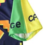 Sleeve detail of the Mexico Retro Goalkeeper jersey from 1995 - Player Version, showing vibrant green and yellow colors with partial text.