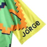 Close-up of the Mexico Retro Goalkeeper 1995 Player Version jersey, featuring colorful geometric patterns and the name "Jorge".