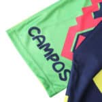 Close-up of the Mexico Retro Goalkeeper 1995 Player Version jersey showing "CAMPOS" text and colorful geometric design.