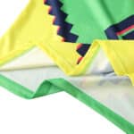 Close-up of the Mexico Retro Goalkeeper jersey | 1995 Player Version, showcasing the vibrant green and yellow fabric details.