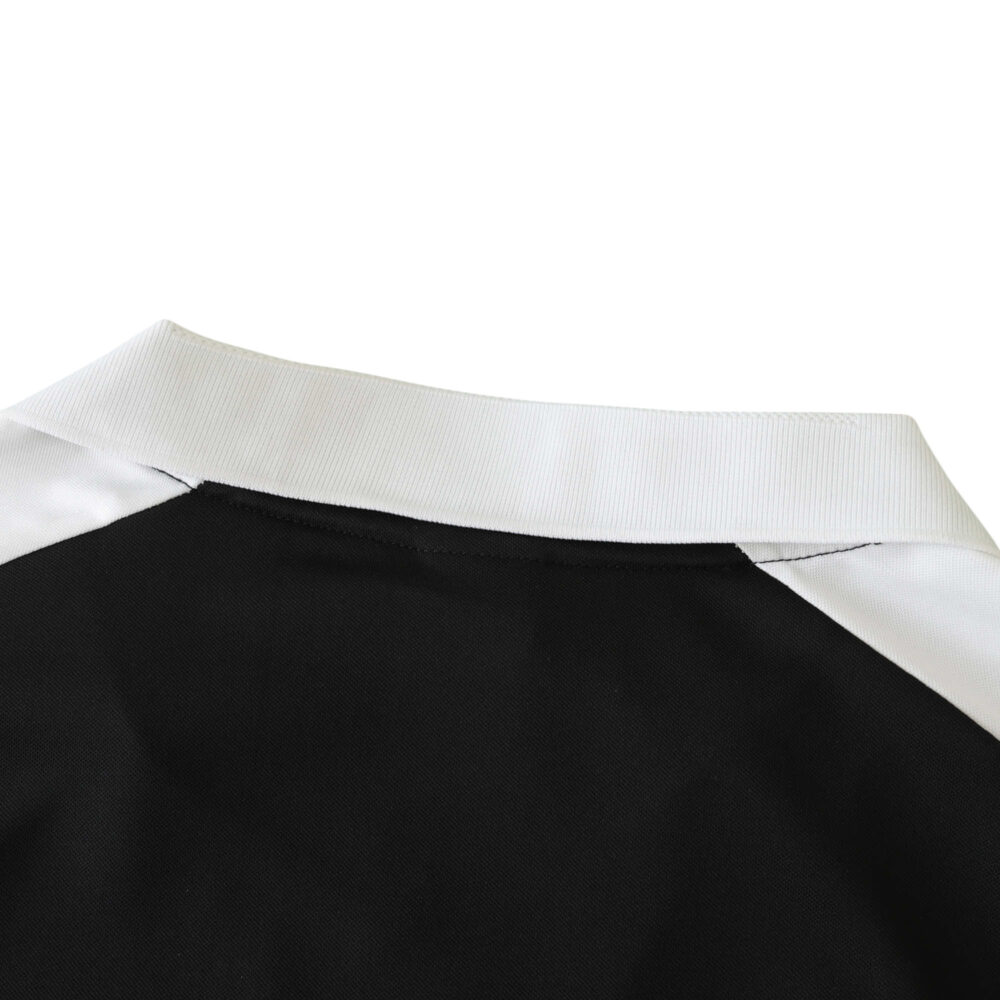 Close-up view of the collar and upper back section of a Real Madrid Retro Away jersey from 2001/02.