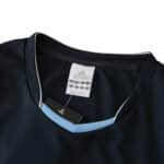 Real Madrid Retro Away 2003/04 Fan Version jersey, featuring a close-up of the collar and Adidas tag.