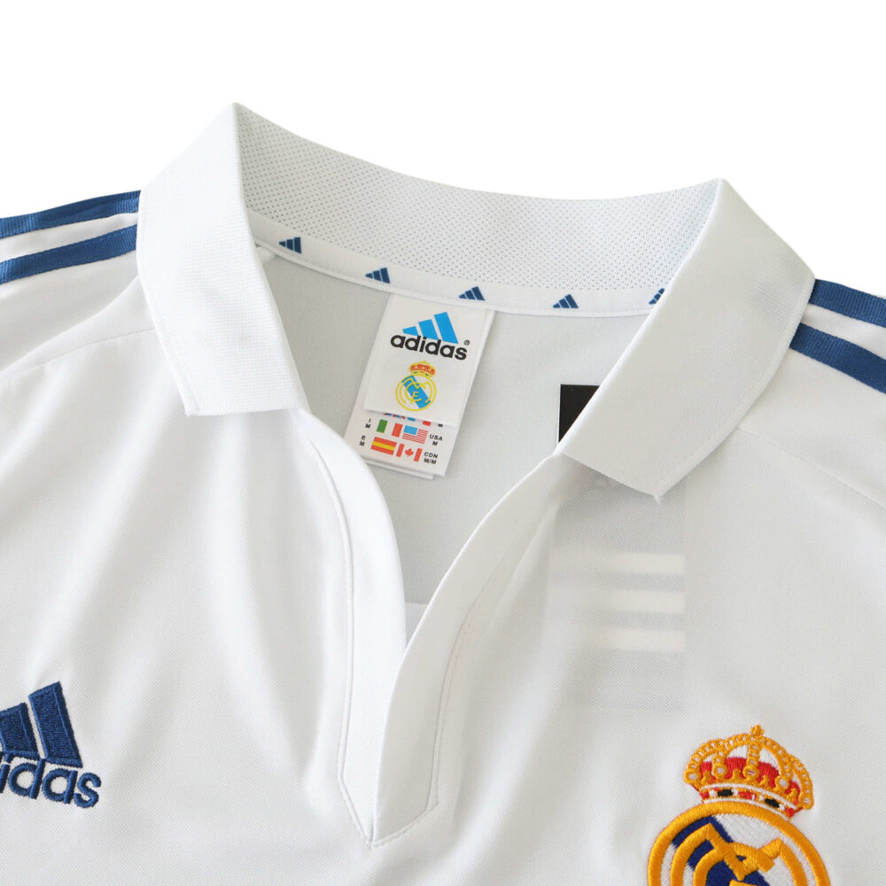 Real Madrid Retro Home 2001/02 Fan Version jersey on display, featuring the club's crest, Adidas logo, and iconic white color.