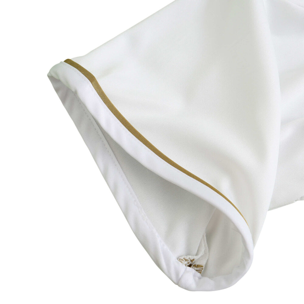 Close-up of a sleeve from the Real Madrid Retro Home 2011/12 Player Version jersey featuring a gold trim detail.