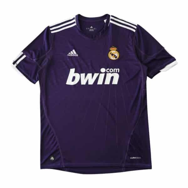 Real Madrid Retro Third | 2010/11 | Fan Version: Purple jersey with Bwin sponsor logo, Adidas stripes on shoulders, and club crest.