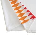 Close-up of the Spain Retro Away 1994 Fan Version jersey, showing its white fabric and red-orange diamond pattern trim.