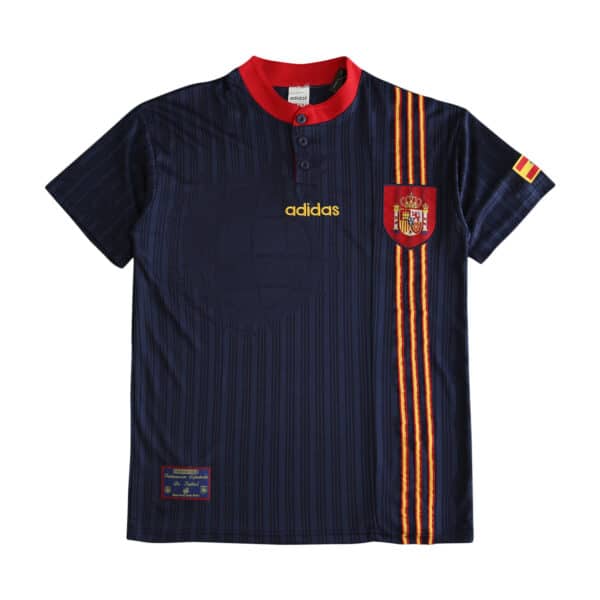 Spain Retro Away soccer jersey, 1996 Fan Version. Navy blue with red collar, yellow Adidas logo, and Spanish flag detail on sleeve.