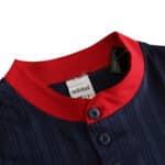 Close-up of the collar and buttons on the Spain Retro Away 1996 Fan Version jersey, featuring a red trim and adidas tag.