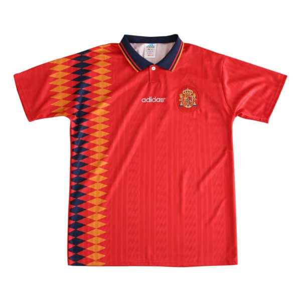 1994 Spain Retro Home Jersey, Fan Version. Red with yellow and navy geometric pattern on left side, Adidas logo and crest on chest.