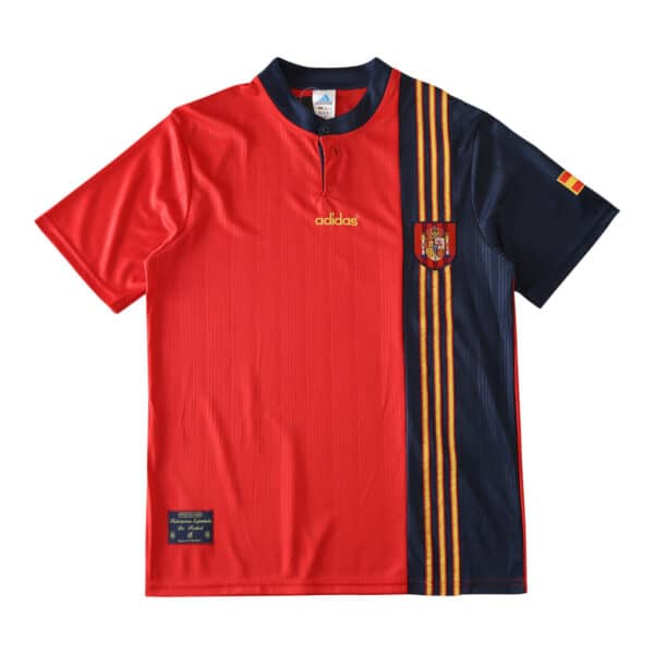 Spain Retro Home 1996 Fan Version soccer jersey in red and navy with gold stripes, Spain crest, Adidas logo, and Spanish flag on sleeve.