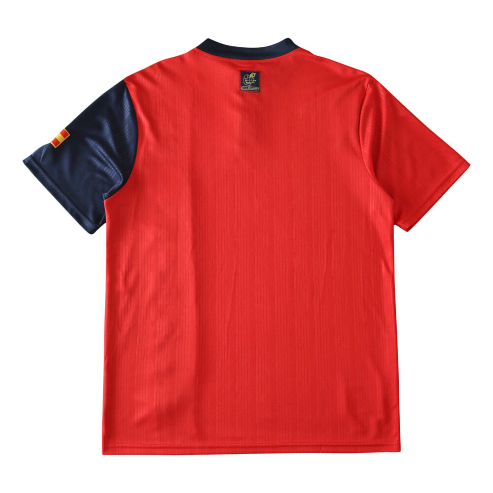 Spain Retro Home 1996 Fan Version jersey, red with navy shoulder patches and a small Spanish flag on the left sleeve.