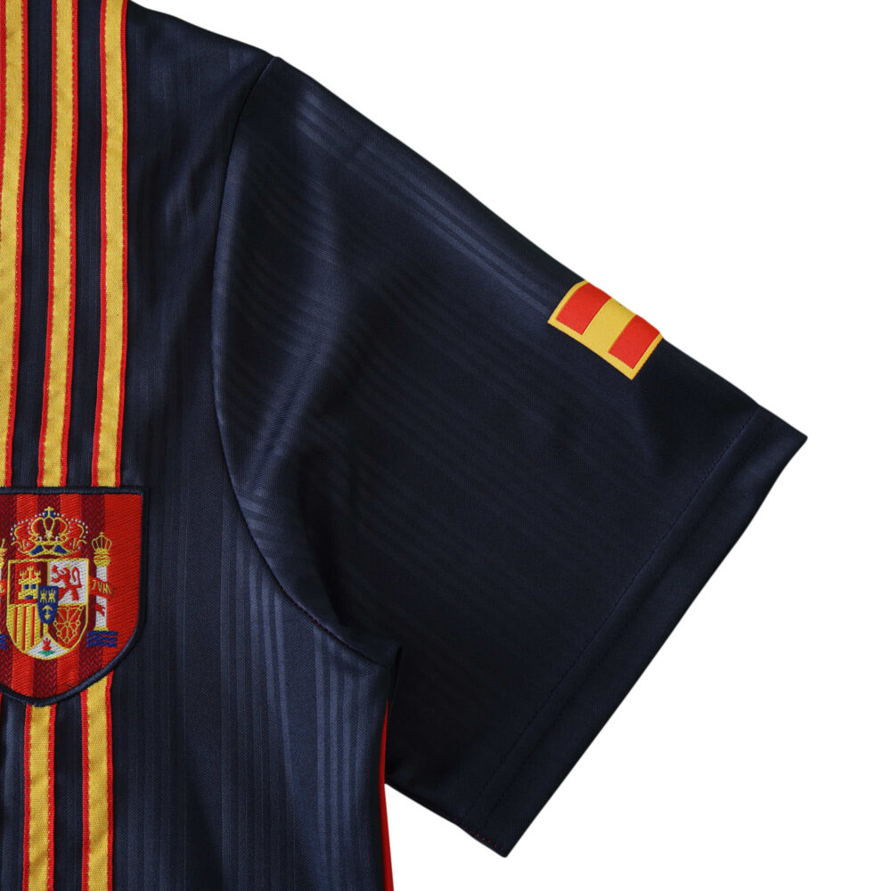 Spain Retro Home 1996 Fan Version jersey, dark fabric with vertical red and yellow stripes, national emblem on the chest.