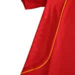 Close-up of the Spain Retro Home 2008 Fan Version jersey, highlighting its red fabric and yellow trim.