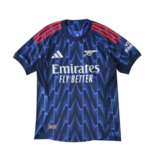 Arsenal Away 2025/26 Player Version jersey in navy blue with red accents and zigzag pattern.
