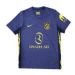 Atlético Madrid Away 2025/26 Fan Version jersey in purple with yellow accents and sponsor logos.