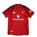 Manchester United 2025/26 Home Player Version jersey in red with club crest, Adidas logo, and Snapdragon sponsor.