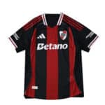 River Plate Away 2025/26 Player Version jersey in black and red stripes with sponsor and club logo.