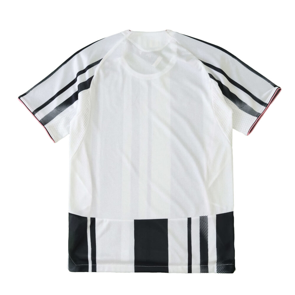 Back view of the Juventus 2025/26 home player version jersey with black stripes on white fabric.