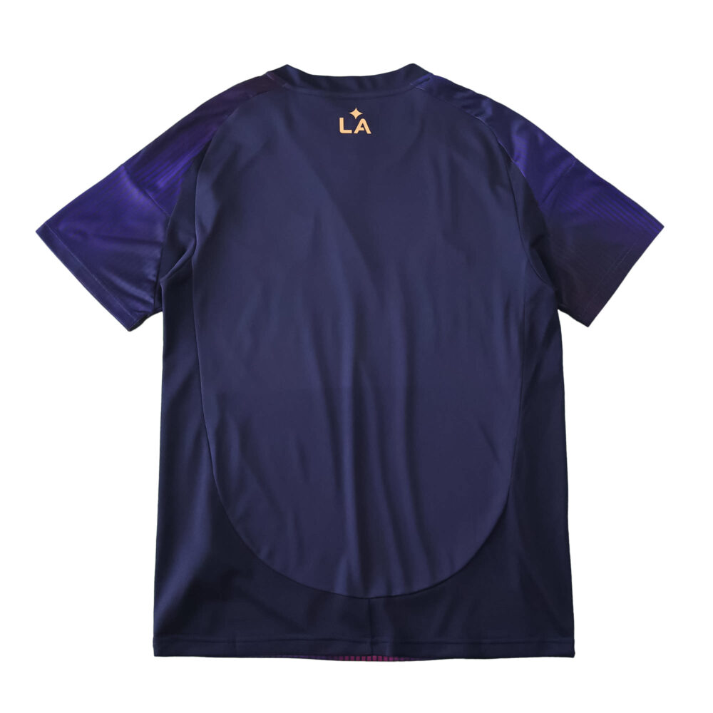 Back view of LA Galaxy Away 2025/26 Fan Version jersey in dark blue with "LA" and a gold star near the collar.
