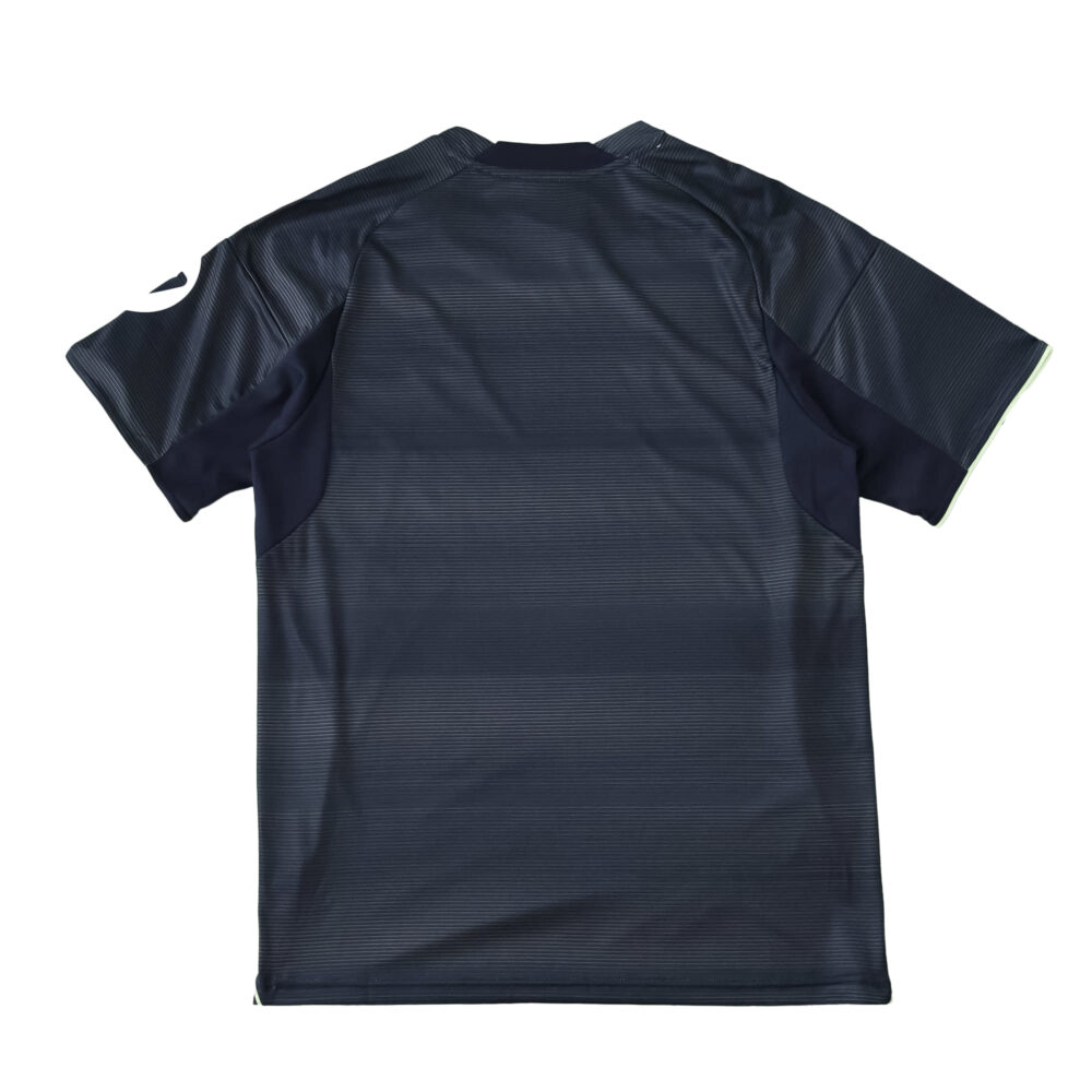 Back view of the Real Madrid Away 2025/26 Fan Version jersey in dark navy with subtle horizontal stripes.