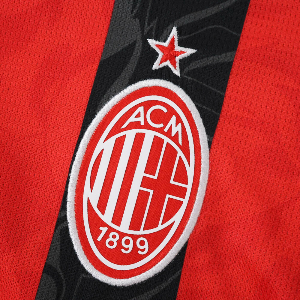Close-up of the AC Milan 2025/26 Home Fan Version jersey featuring the club crest and red star.