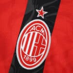Close-up of the AC Milan 2025/26 Home Fan Version jersey featuring the club crest and red star.