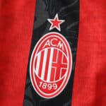 AC Milan 2025/26 Home Player Version jersey with club crest and star on red and black stripes.