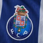FC Porto crest on blue and white striped 2025/26 Home Player Version jersey fabric.