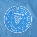 Inter Miami CF 2025/26 Third Player Version jersey badge with club crest on light blue fabric.