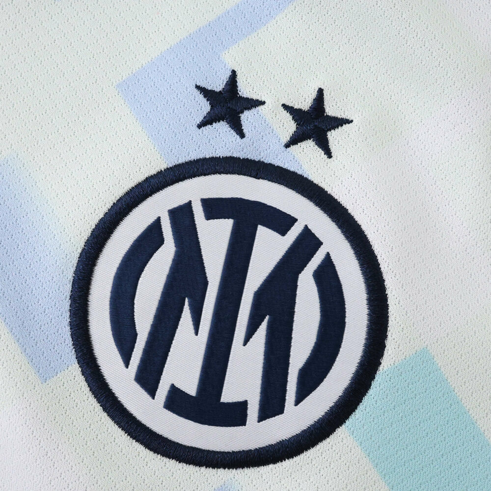 Close-up of Inter Milan logo with two stars on the 2025/26 away fan version jersey.