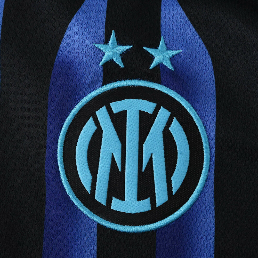 Inter Milan 2025/26 home fan jersey badge with blue and black stripes, featuring the club crest and two stars.