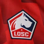 Lille LOSC 2025/26 home fan jersey badge featuring the club's crest on red fabric.