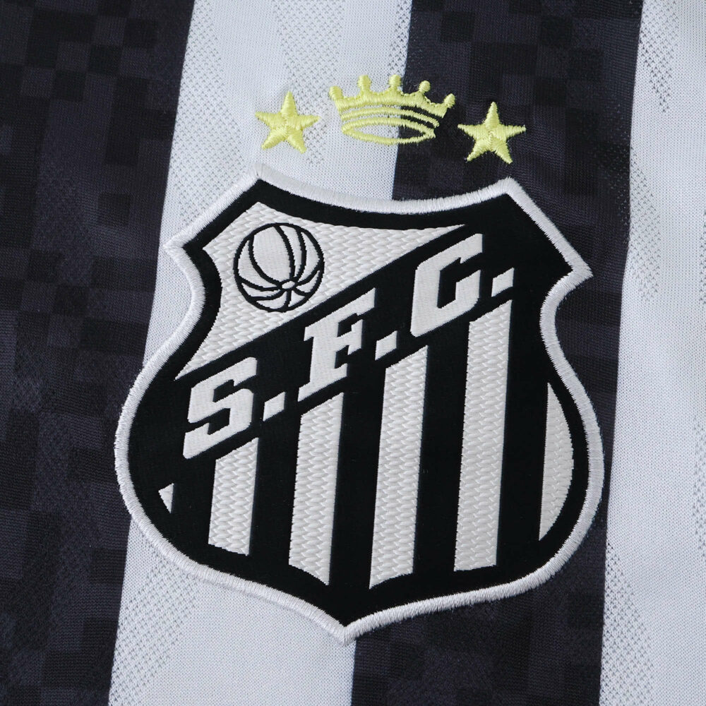 Santos FC Away 2025/26 Fan Version badge with crown and stars on black and white striped fabric.
