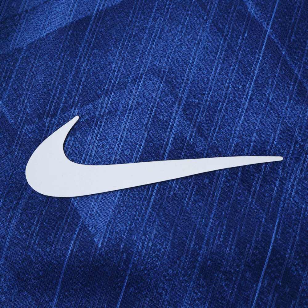 Close-up of the white Nike logo on the blue 2025/26 Chelsea Home Player Version jersey.
