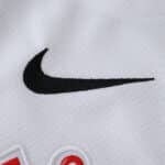 Close-up of the black Nike logo on the white Corinthians 2025/26 home fan version jersey.