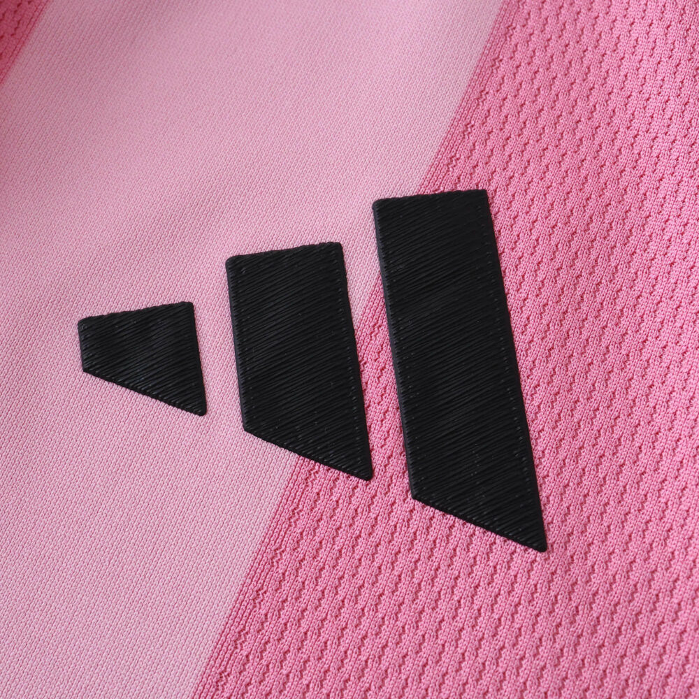 Close-up of the black Adidas logo on the pink 2025/26 Inter Miami CF Home Player Version jersey.