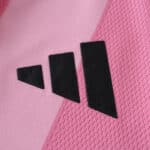 Close-up of the black Adidas logo on the pink 2025/26 Inter Miami CF Home Player Version jersey.