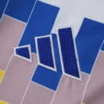Close-up of the Adidas logo on the Leeds United 2025/26 Home Fan Version jersey fabric.