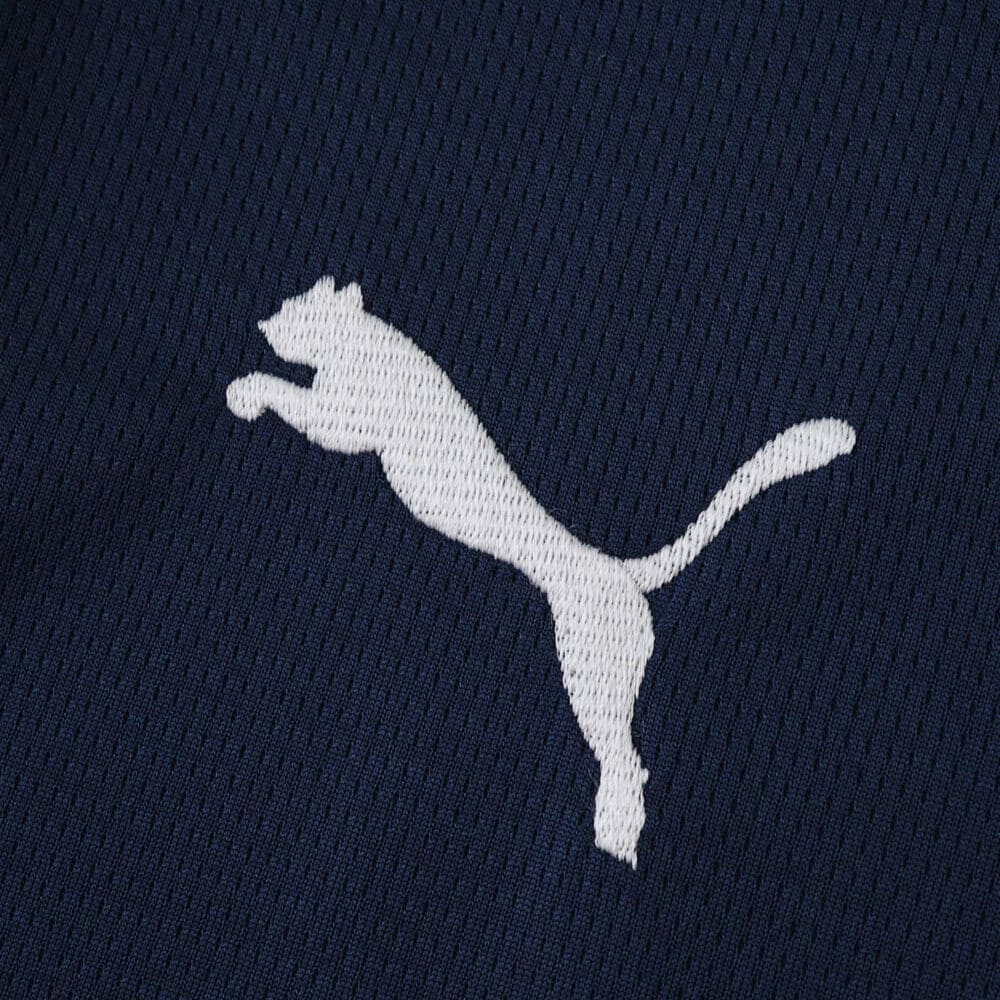 White Puma logo on dark blue fabric of the PSV Eindhoven Away 2025/26 Fan Version jersey.
