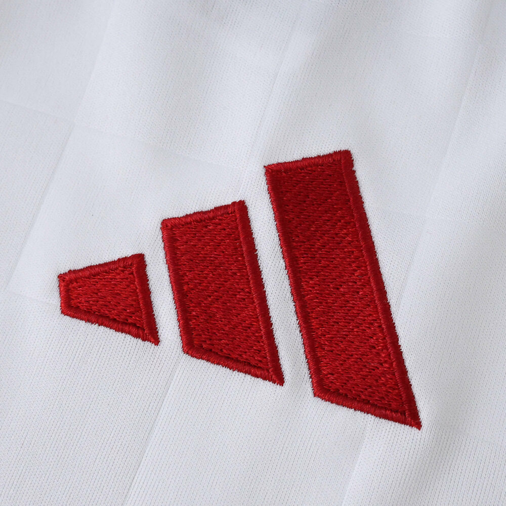 Red Adidas logo embroidered on white SL Benfica Third 2025/26 Fan Version jersey fabric.