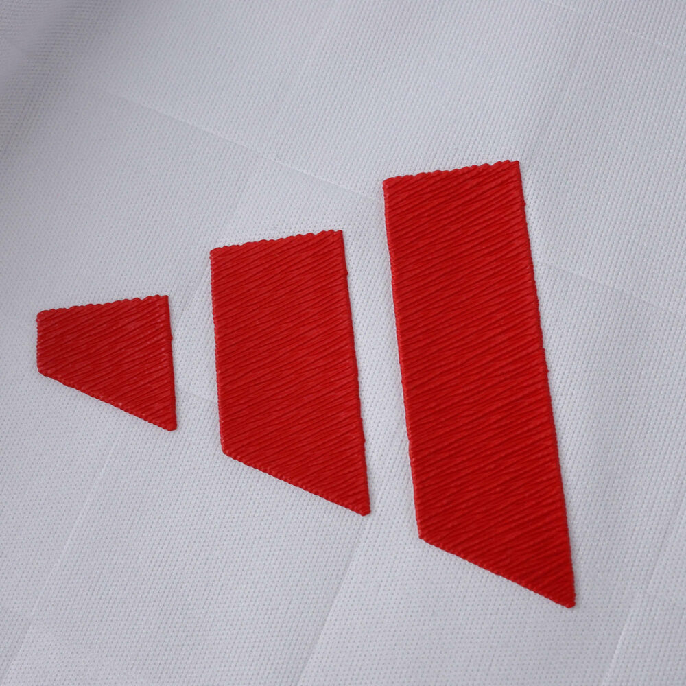 Close-up of the red Adidas logo on the SL Benfica Third 2025/26 Player Version jersey.