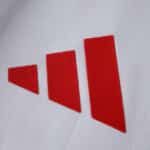 Close-up of the red Adidas logo on the SL Benfica Third 2025/26 Player Version jersey.