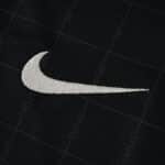 Close-up of the Nike logo on the Tottenham Hotspur 2025/26 away fan version jersey.